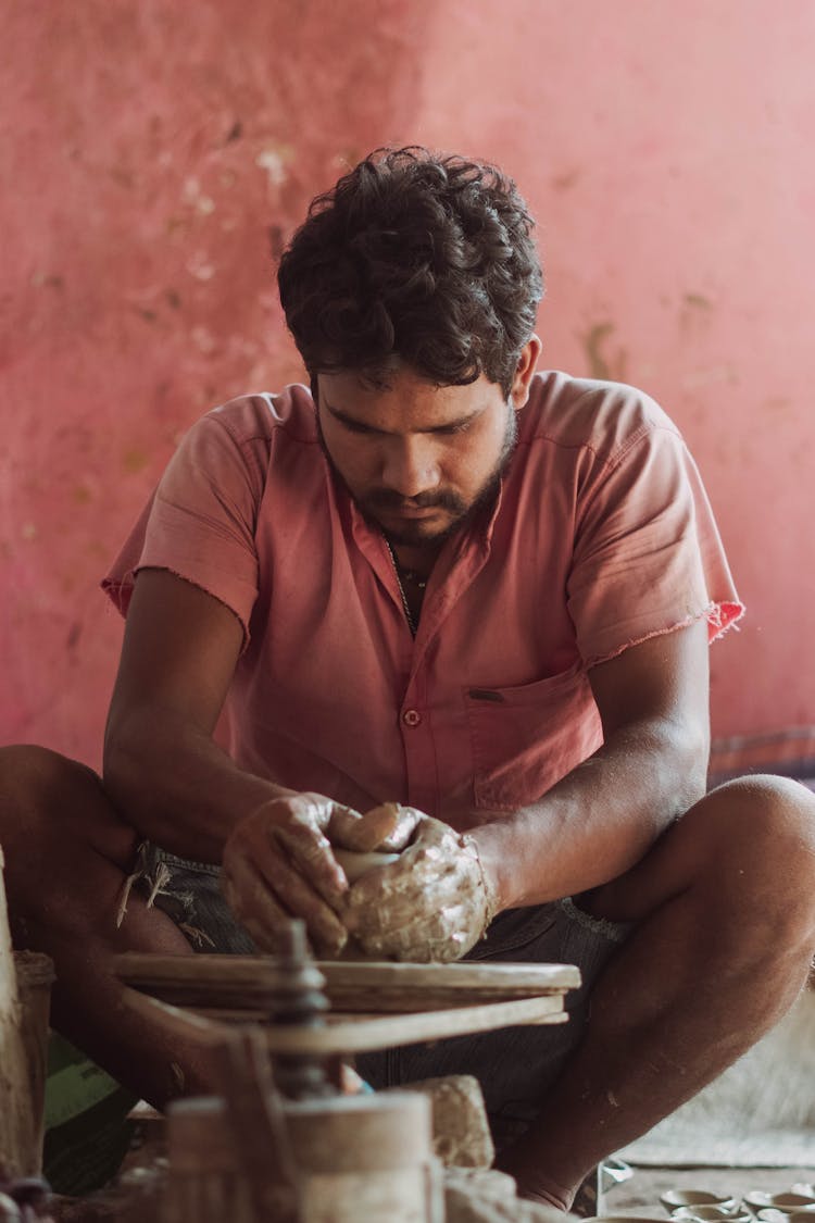 A Man Making A Pot