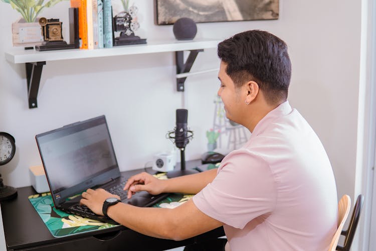 Man With Laptop In Room