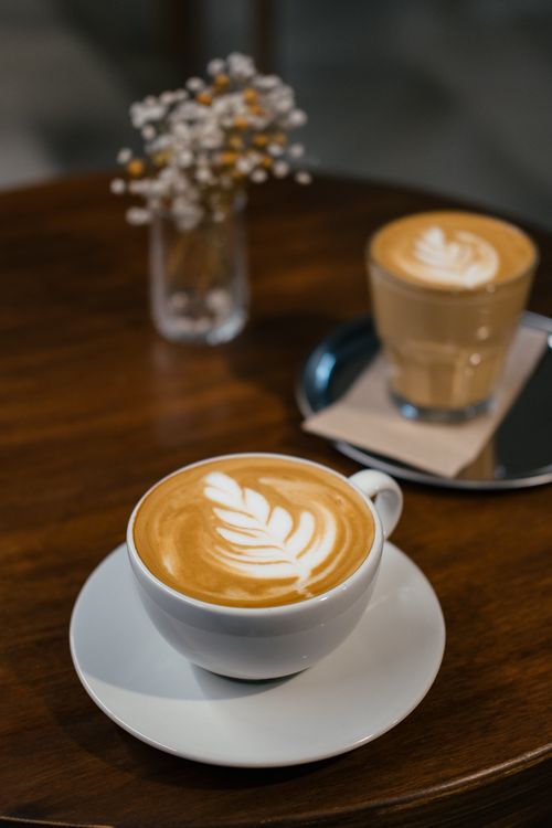 Free Close-up of a beautifully crafted latte art in a cozy café setting, highlighting coffee culture in Istanbul. Stock Photo