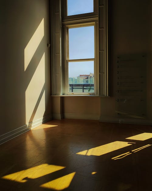 Light Shining through Window into Empty Room