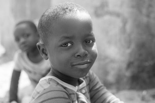 Smiling Boy in Black and White