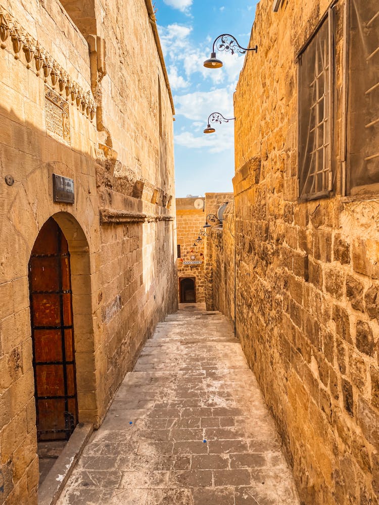 Narrow Passage Between Stone Buildings