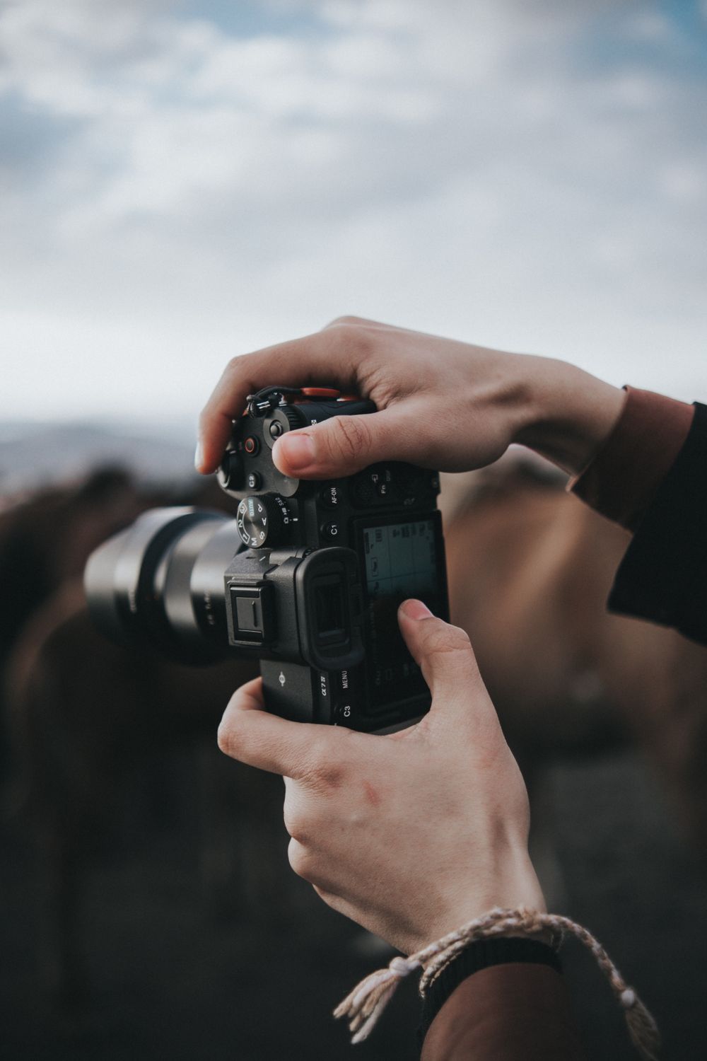 Hand With Camera Hand Holding Camera · Free Stock Photo