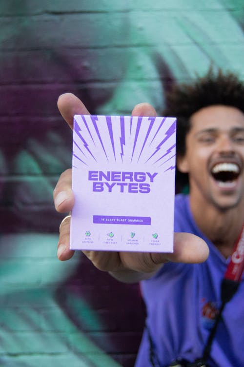 Man holding energy gummies