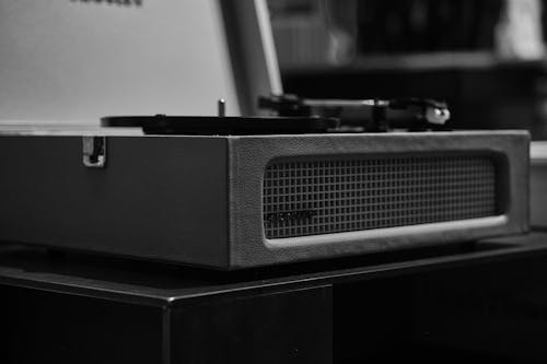 Grayscale Photo of a Vinyl Record Player