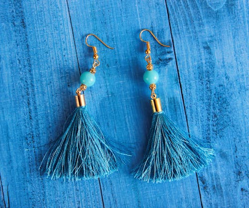 Close-Up Photography of Blue Earrings