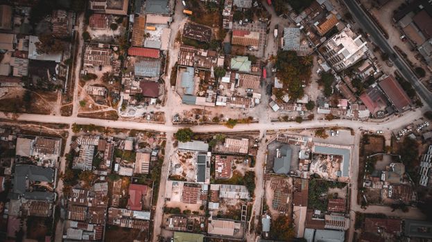 Drone shot of urban streets and buildings in Dar es Salaam, Tanzania.