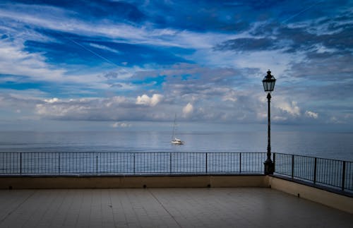 bulutlar, deniz, görünüm içeren Ücretsiz stok fotoğraf