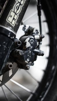 Detailed view of a bicycle wheel focusing on gearshift mechanics.