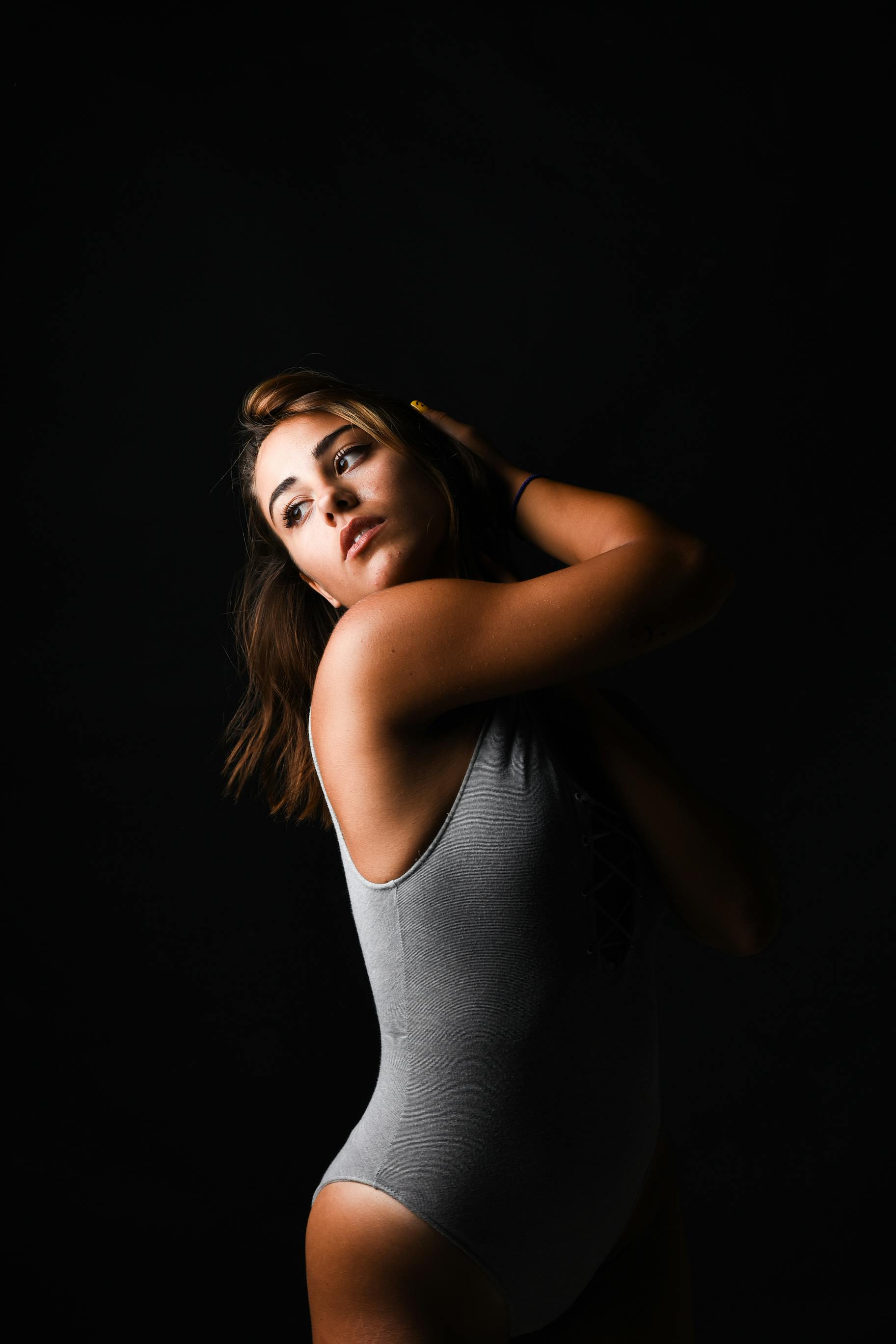 Toned woman posing body Stock Photo - Alamy