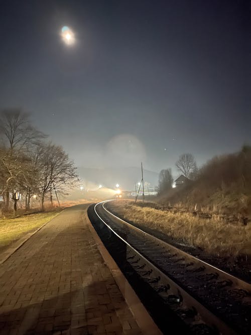 Railroad in the mountains at night