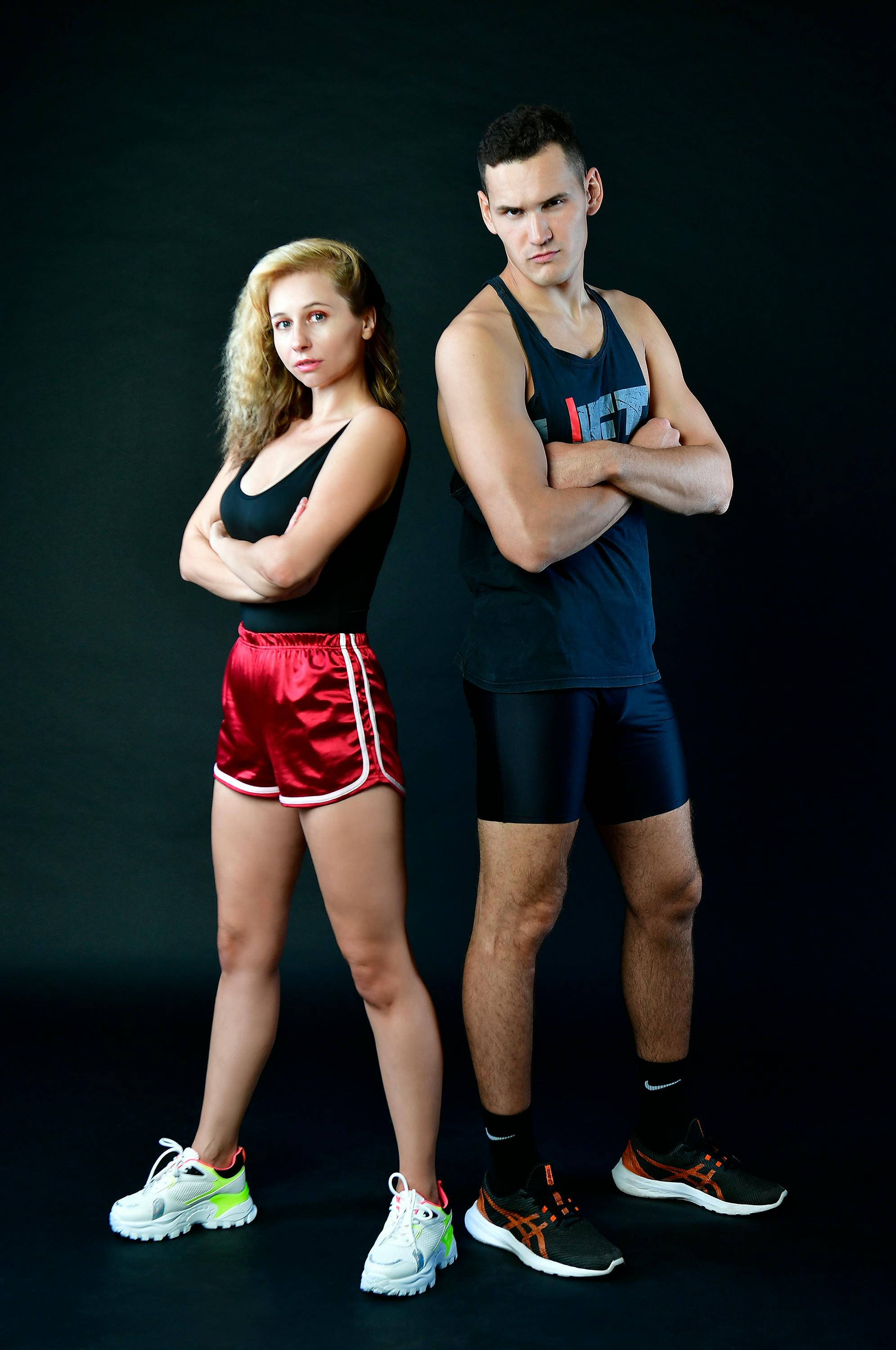 Free Woman in Blue and Red Nike Tank Top and Red Shorts Stock Photo