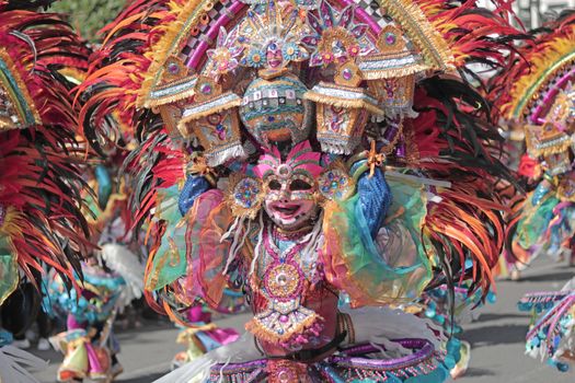 A colorful and vibrant costume from a traditional carnival festival parade.