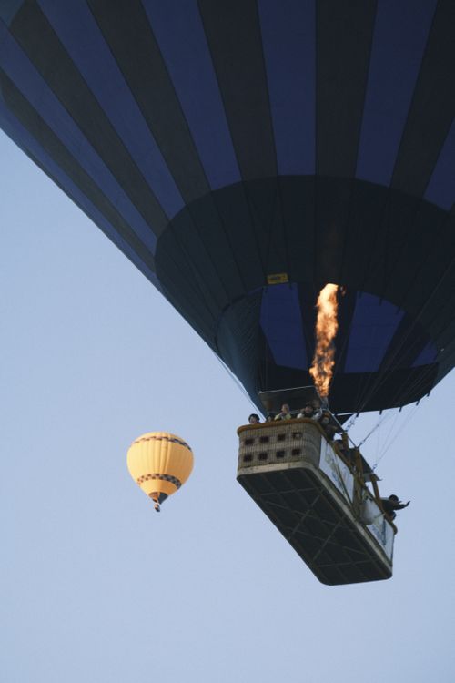 Free Captivating view of colorful hot air balloons floating gracefully in the open sky. Stock Photo
