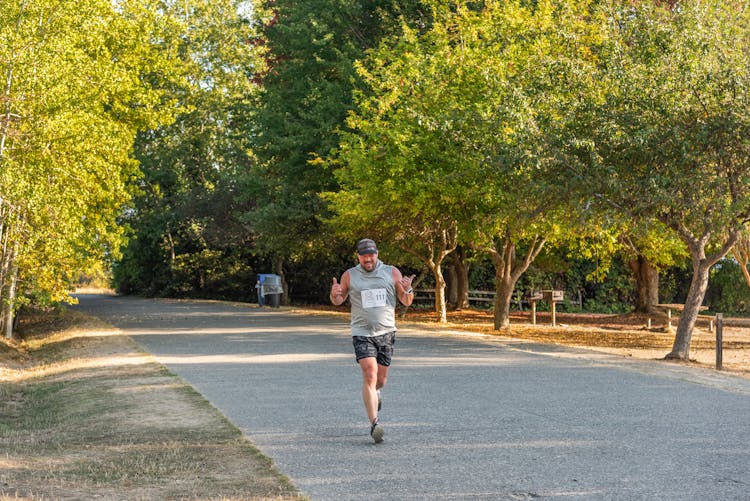 Man Running On The Road