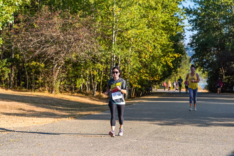 Runners on an autumn road during a half marathon
