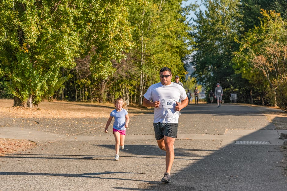 Parent running in park with jogging stroller surrounded by nature - jogging stroller vs regular stroller Parent running in park with jogging stroller surrounded by nature - jogging stroller vs regular stroller