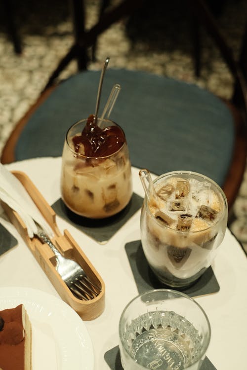 Free Glasses of Ice Coffee on a Round Table Stock Photo