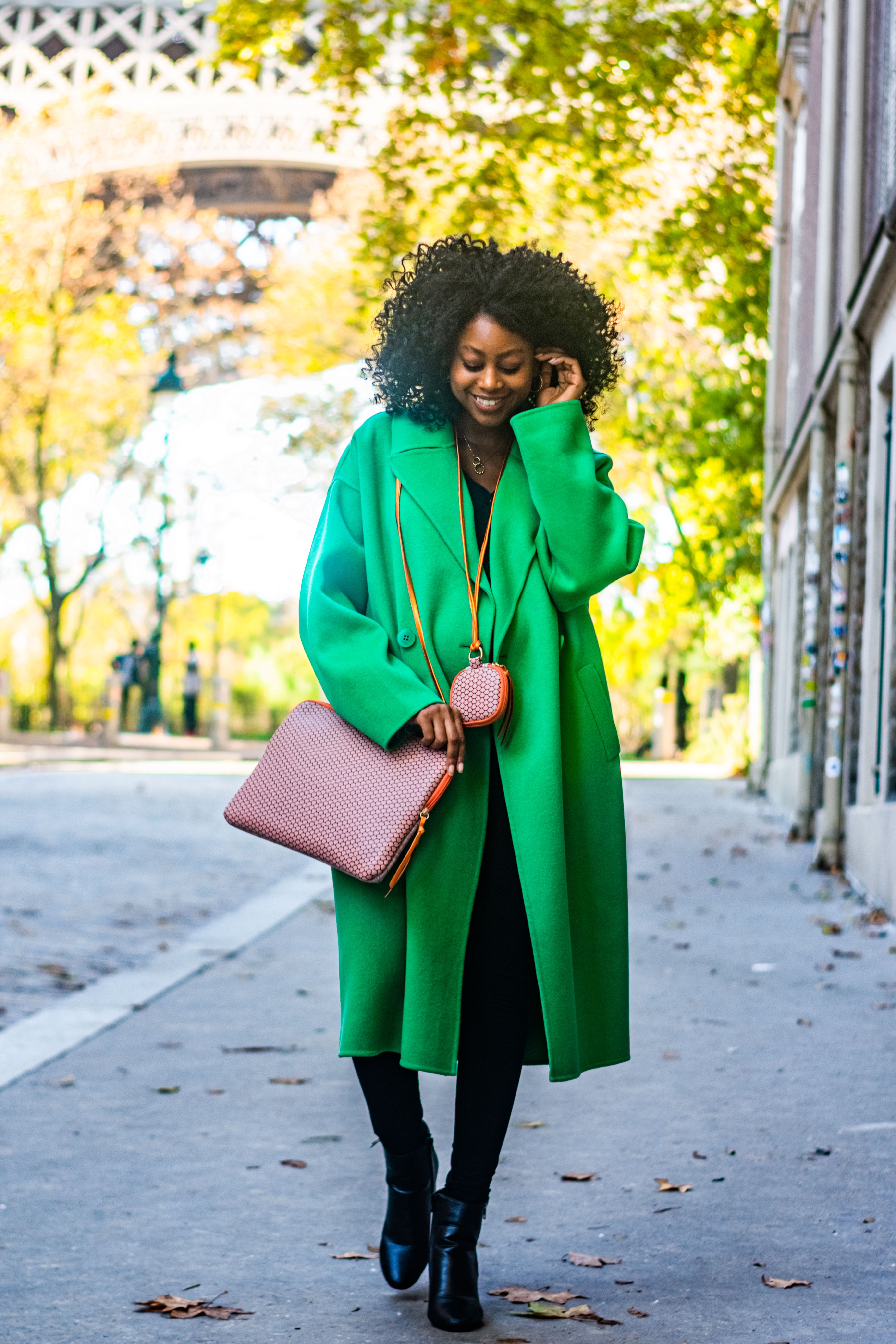 Woman Wearing Green Coat on a Street · Free Stock Photo