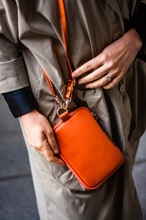 Woman Wearing Orange Bag 