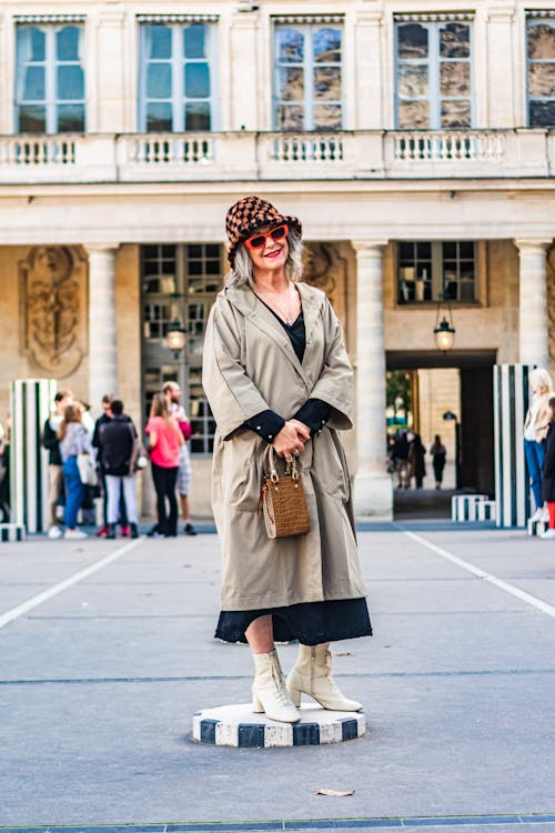 Woman Wearing Khaki Dress on a Square in Louvre 