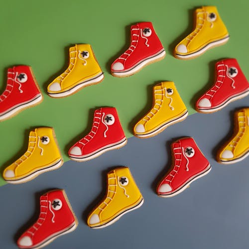 Gratis stockfoto met all star schoenen, biscuit, sportschoenen