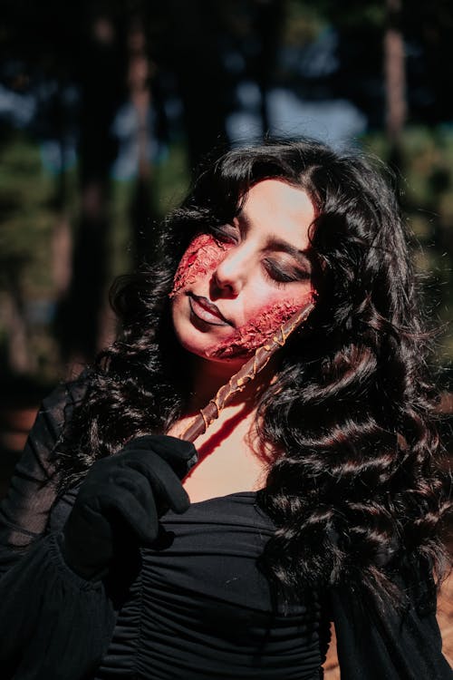 Brunette Woman with Makeup for Halloween