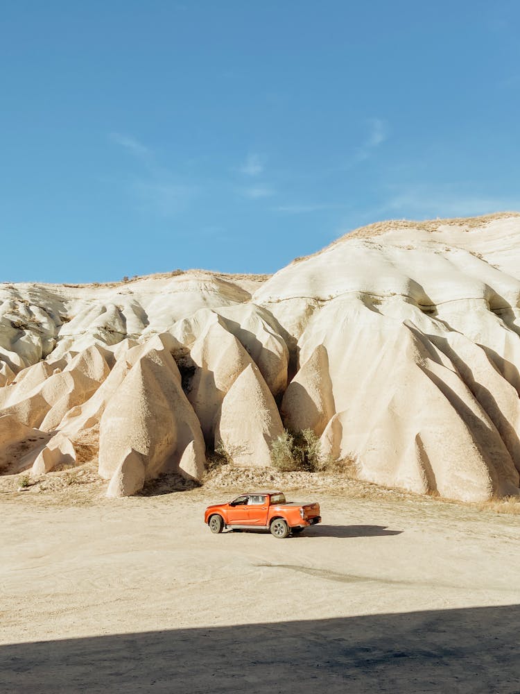 Car In Desert Mountain Landscape