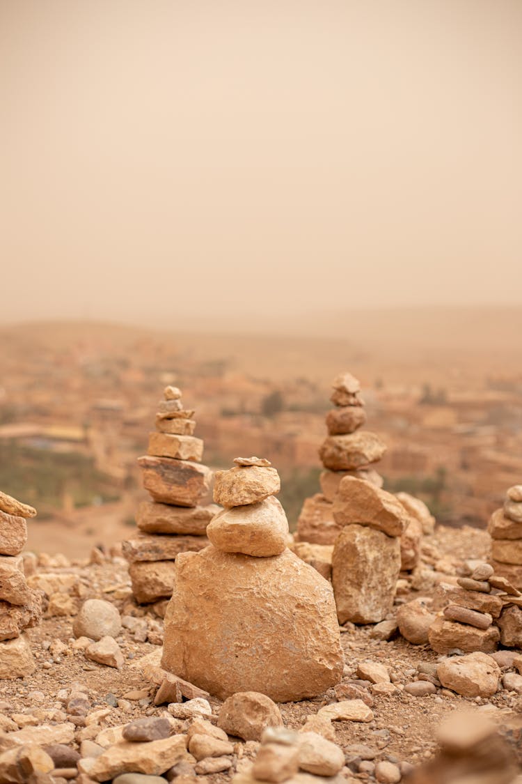 Stone Stacking On Top Of A Mountain