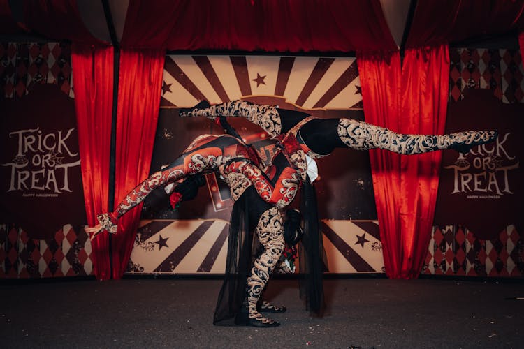 People Performing A Contortion Act