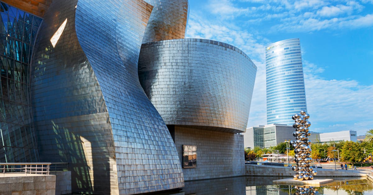 Futuristic Curved Building Reflecting In Murky Pool Water Free Stock futuristic-curved-building-reflecting-in-murky-pool-water-free-stock