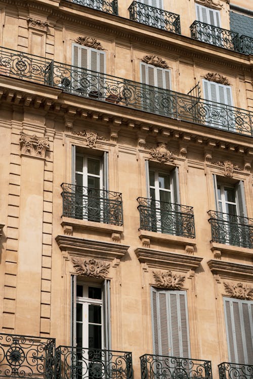 A Low Angle Shot of a Building with Balconies