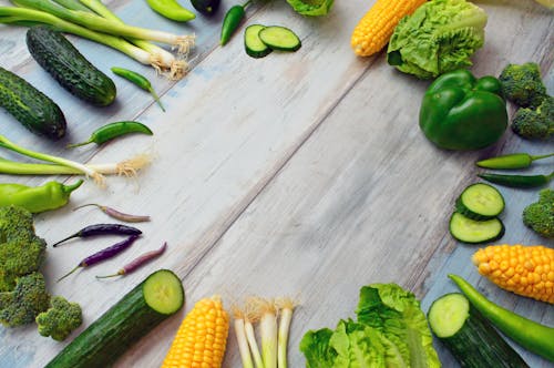 Assorted Vegetables on Brown Wooden Table