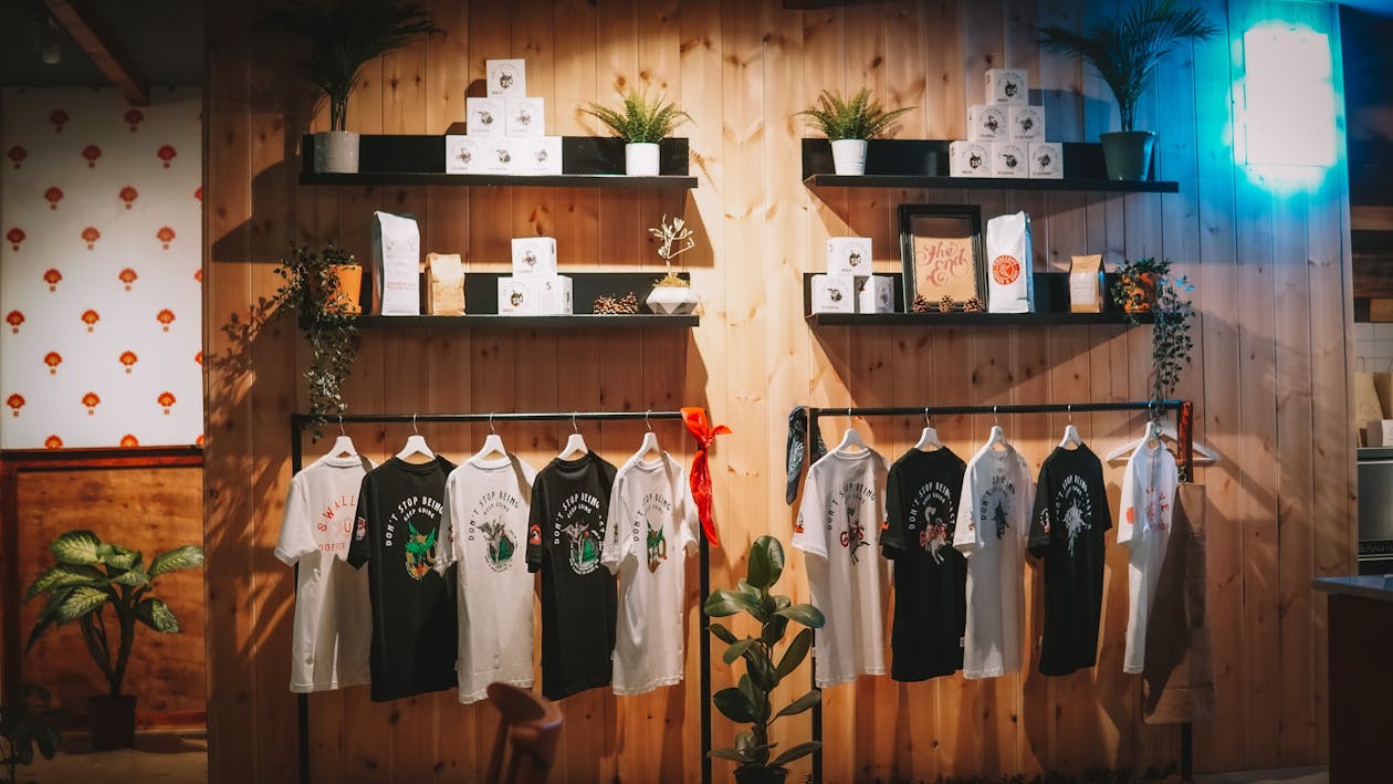 Merch Display Inspo Display of Design Merchandise in Store · Free Stock Photo