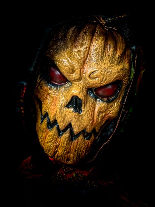Person Wearing a Scary Halloween Mask