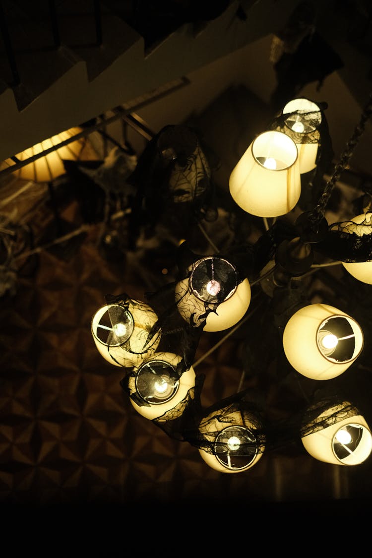 Illuminated Lamps Hanging From The Ceiling