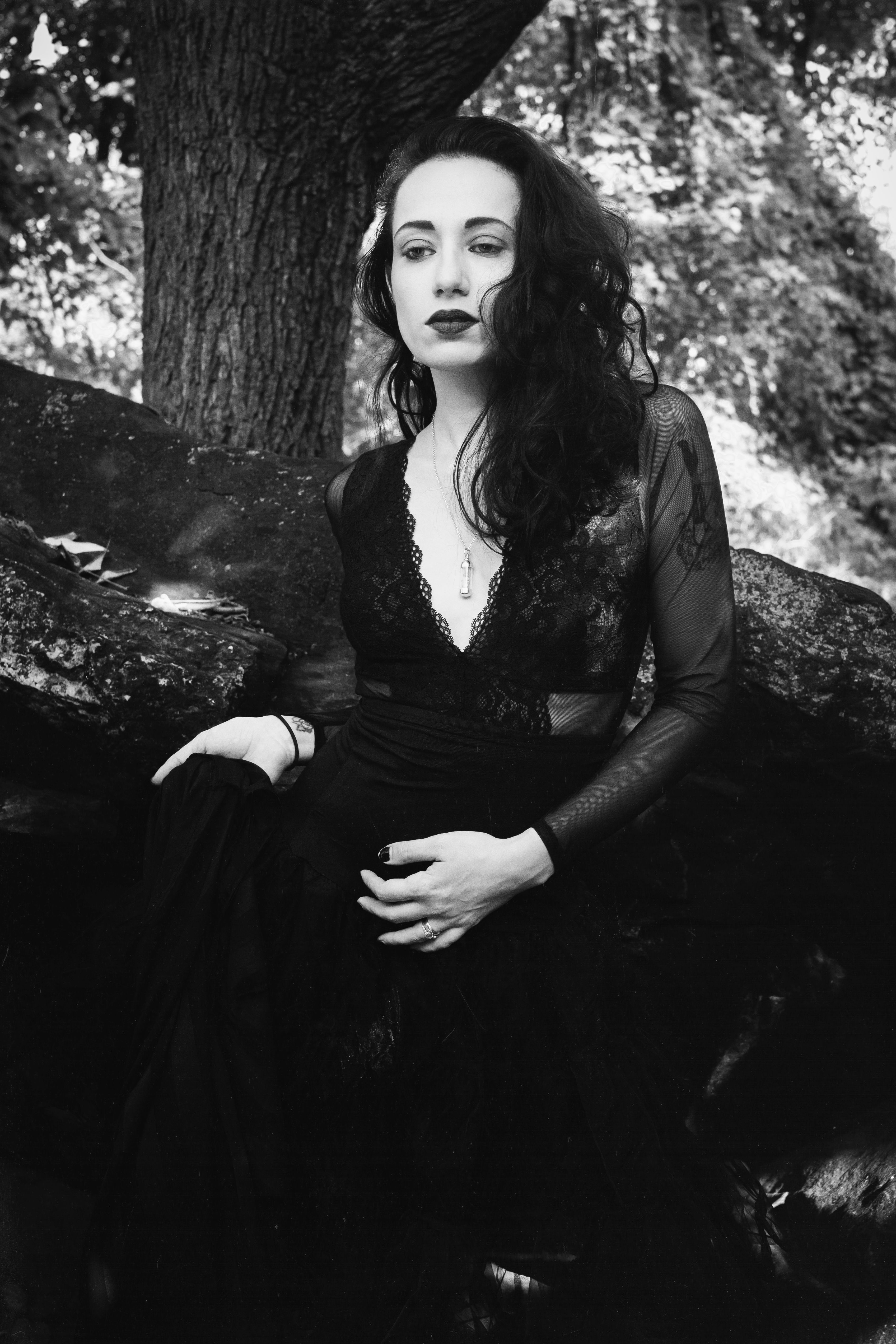 Grayscale Photo of a Woman in a Dress · Free Stock Photo