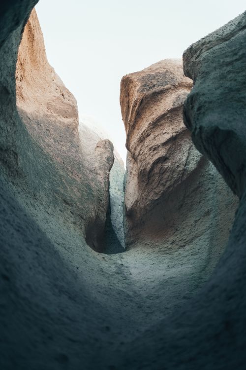 Free A breathtaking view of a rocky canyon with natural formations under a vast sky. Stock Photo