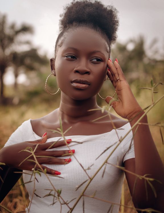 A Woman in White Shirt Posing · Free Stock Photo