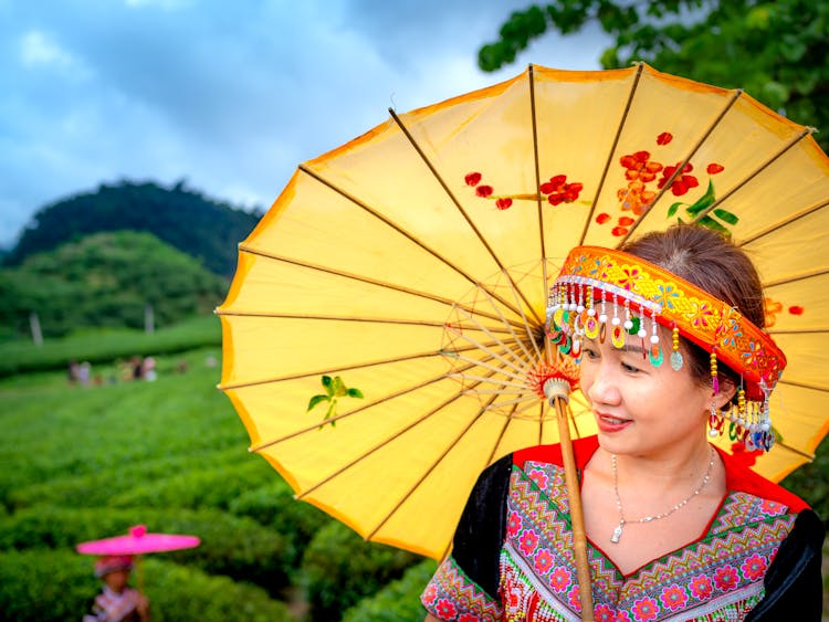 A Woman Using An Umbrella