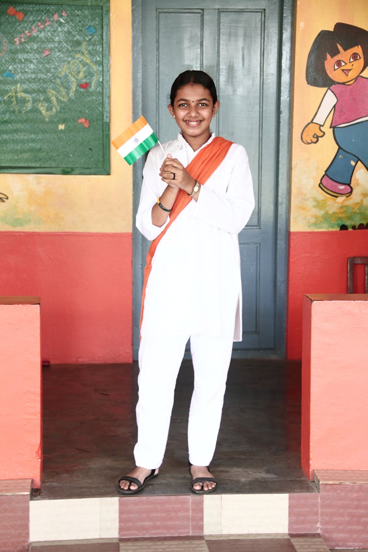 A Woman Holding A Flag