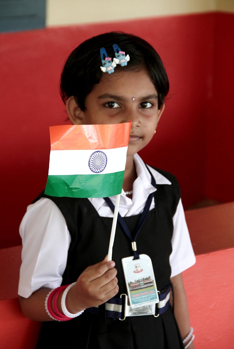 A Woman Holding A Flag