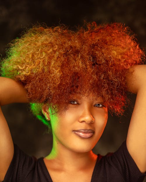 Woman With Curly Hair Smiling