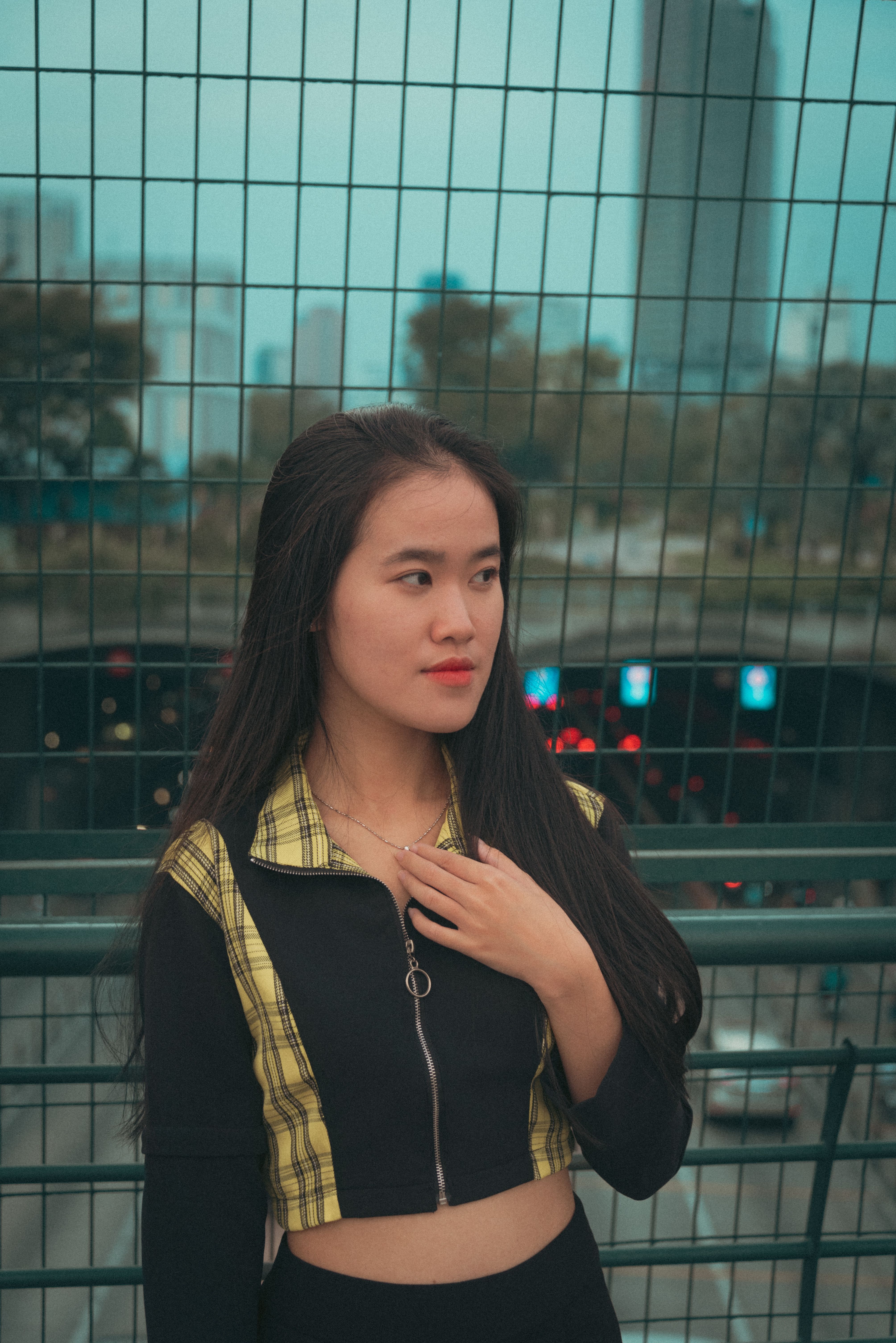 Woman Posing on the Metal Railings · Free Stock Photo