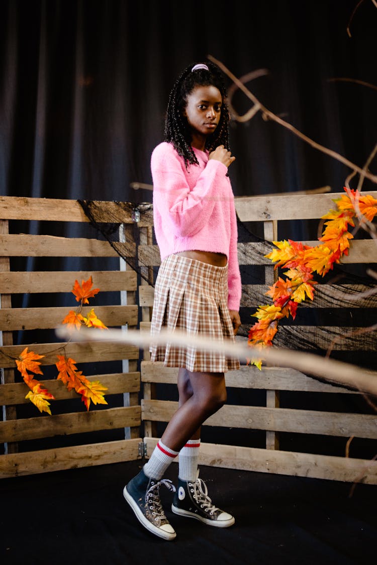 Teenager Girl Posing In Autumn Decorations