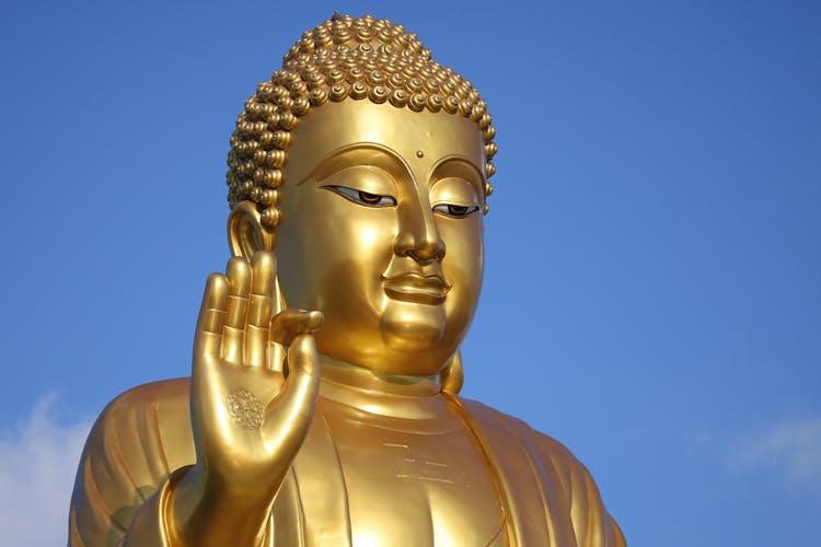 Golden Buddha Under Blue Sky 