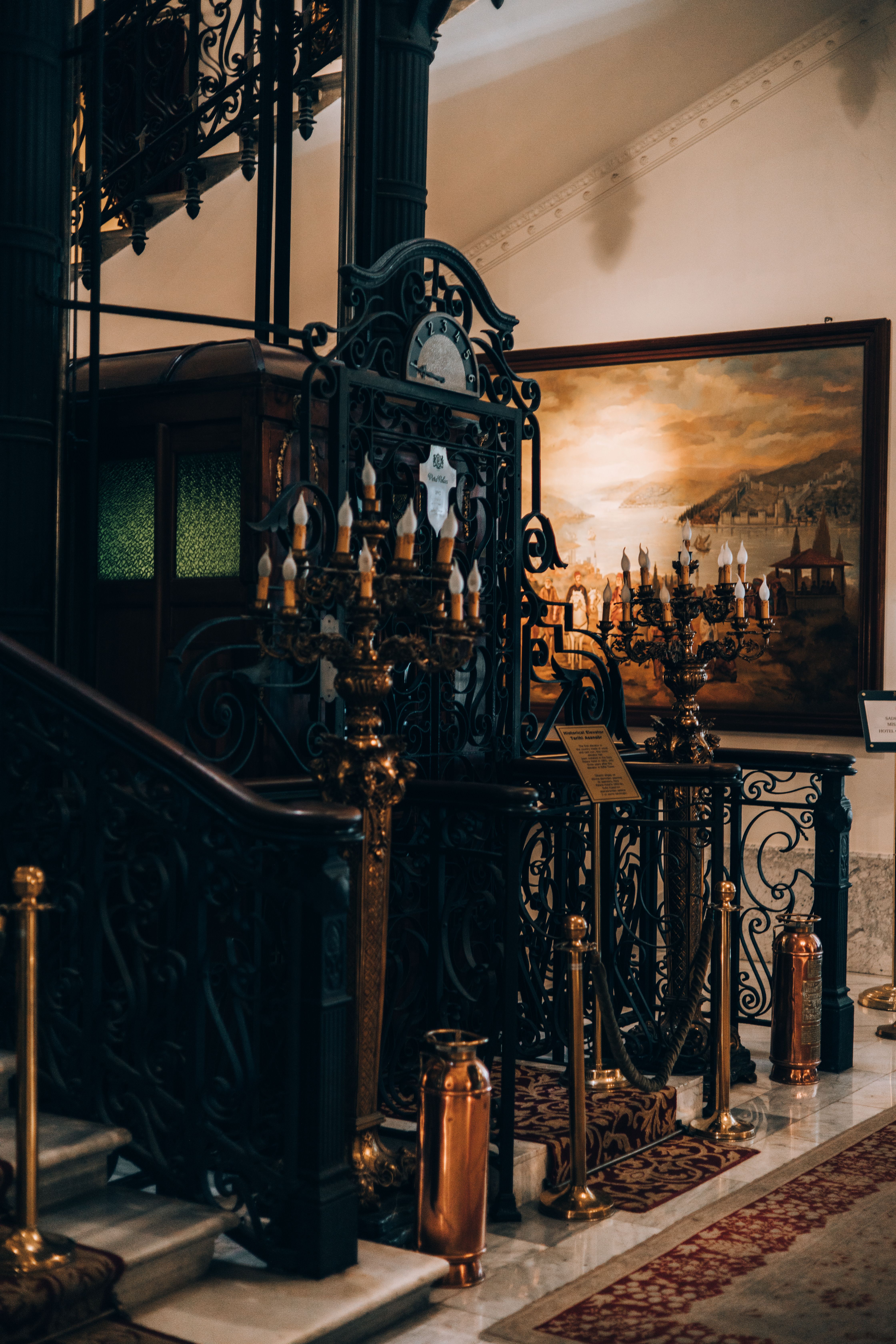 Explore this beautifully preserved vintage elevator with ornate details in Istanbul.