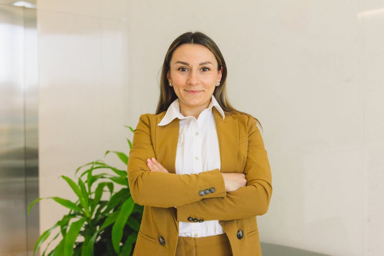 Portrait Of Smiling Woman In Suit