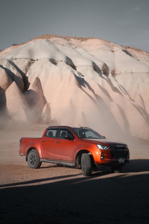 Red Pickup Truck on Desert