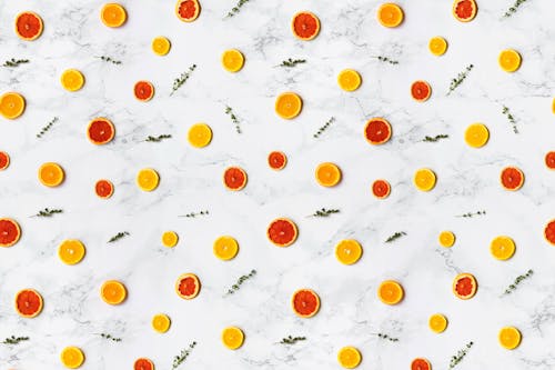 無料 白、赤、黄色の柑橘系の果物 写真素材